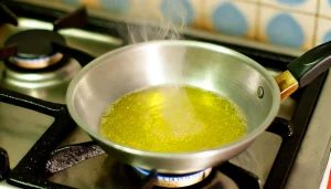 Step 2: Add mustard seeds, cumin seeds