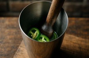 2. Muddle the jalapeño
